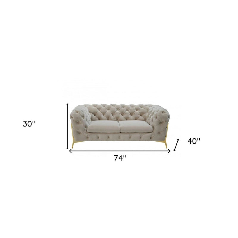 Causeuse Chesterfield HomeRoots 74 en velours beige et doré