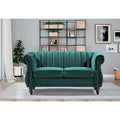 Charlot loveseat van fluweel in Chesterfieldstijl met afgeronde armleuningen