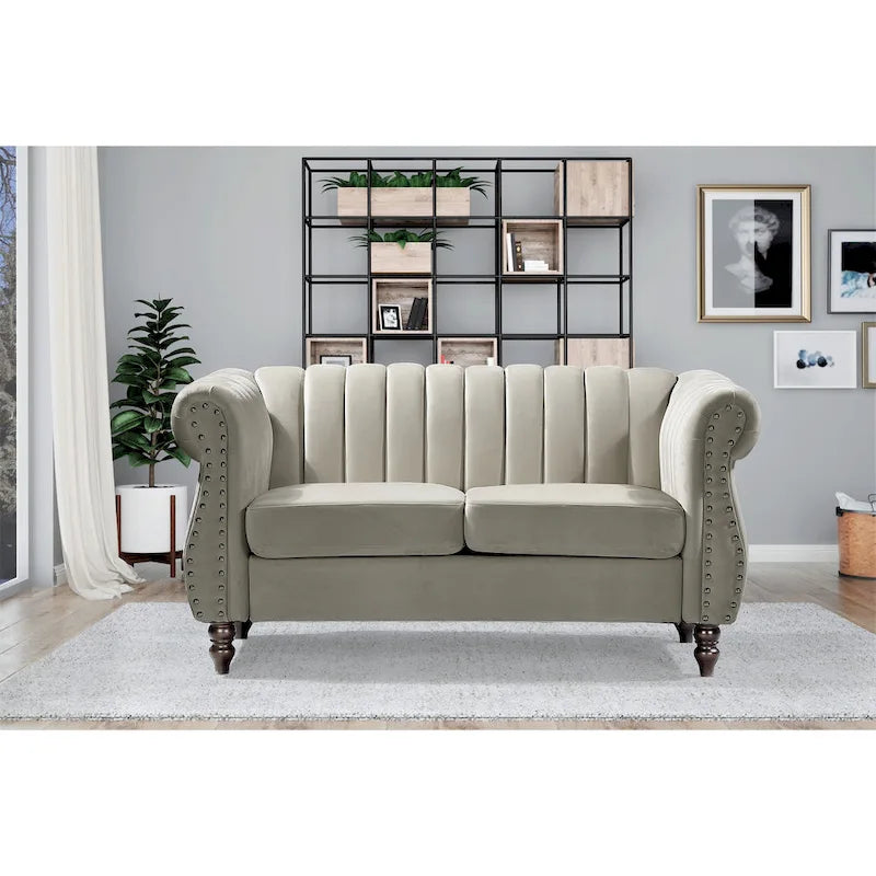 Charlot loveseat van fluweel in Chesterfieldstijl met afgeronde armleuningen