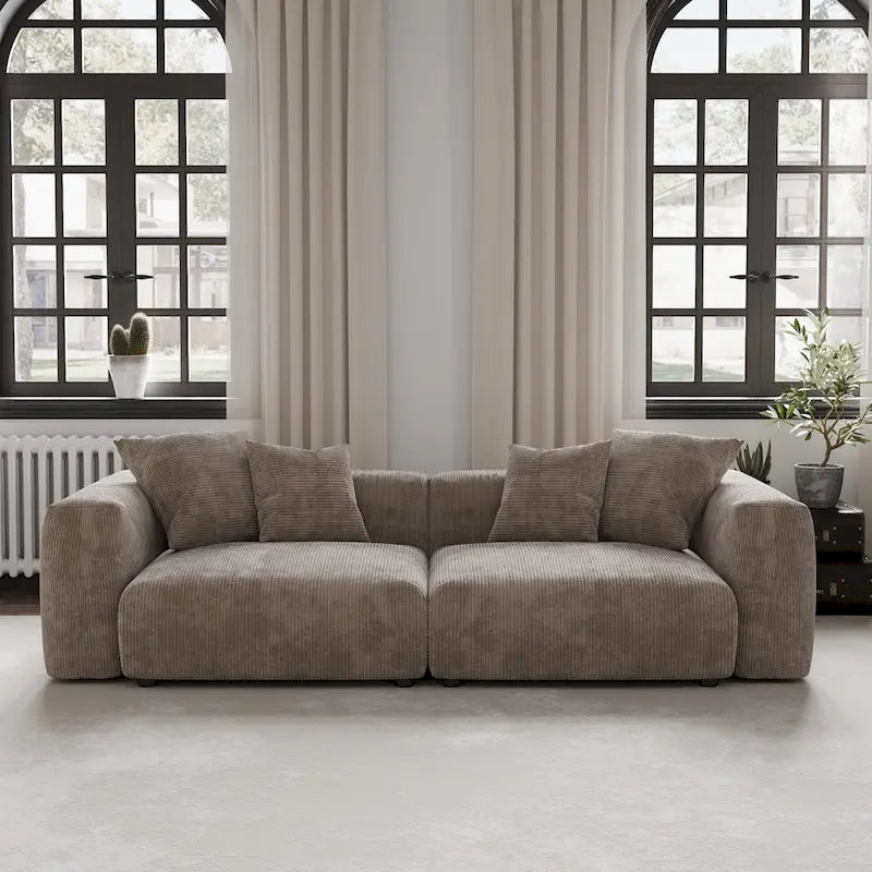 Moderne tweezitsbank van ribstof, loungebank, slaapbank en hoekbank