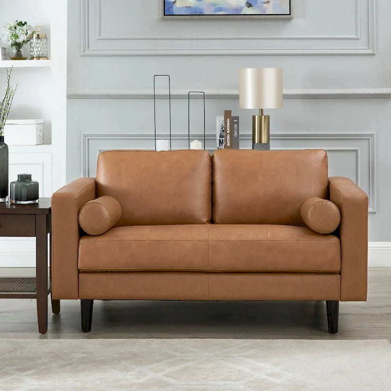 Canapé 2 places de luxe en cuir de vachette avec coussins fermes, design spacieux pour 2 personnes et coussins traversins