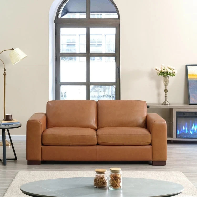 Canapé 2 places de luxe en cuir de vachette avec coussins fermes, design spacieux pour 2 personnes et coussins traversins
