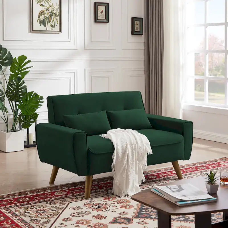 Kleine loveseatbank met capiton van 48.82, 2 kussens en taps toelopende houten poten