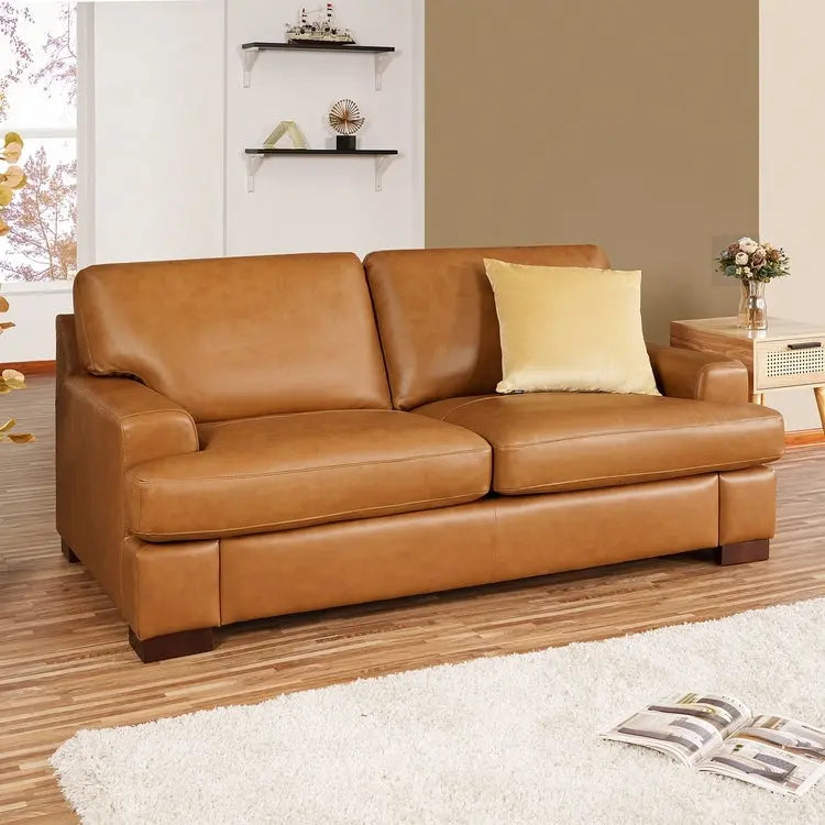 Dwuosobowa sofa z prawdziwej skóry, kwadratowymi podłokietnikami i solidnymi nogami blokowymi – luksusowy komfort, poduszka z gęsiego pierza