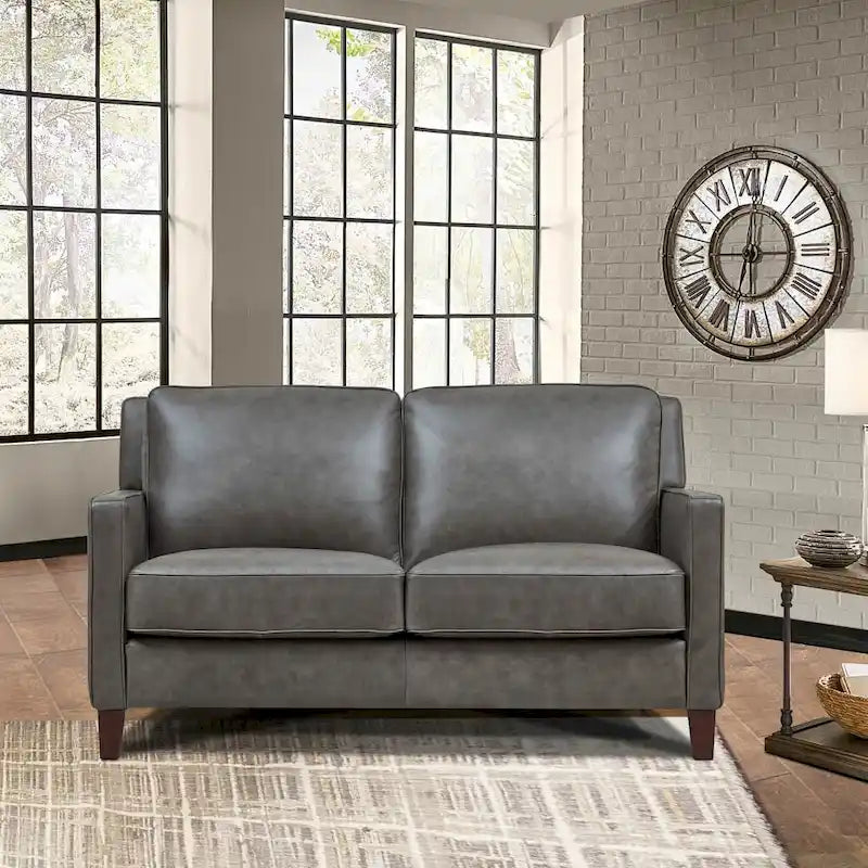Dwuosobowa sofa Hydeline Ashby z wysokogatunkowej skóry licowej, z pierzem, pianką z pamięcią kształtu i sprężynami