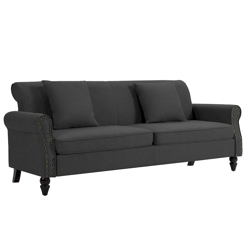 Canapé 73 avec accoudoirs roulés et finition à clous décoratifs