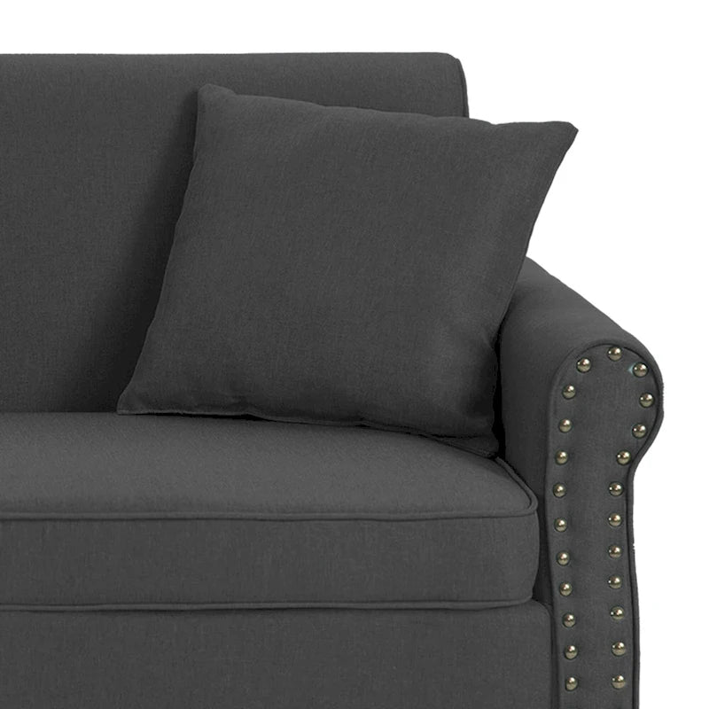 Canapé 73 avec accoudoirs roulés et finition à clous décoratifs