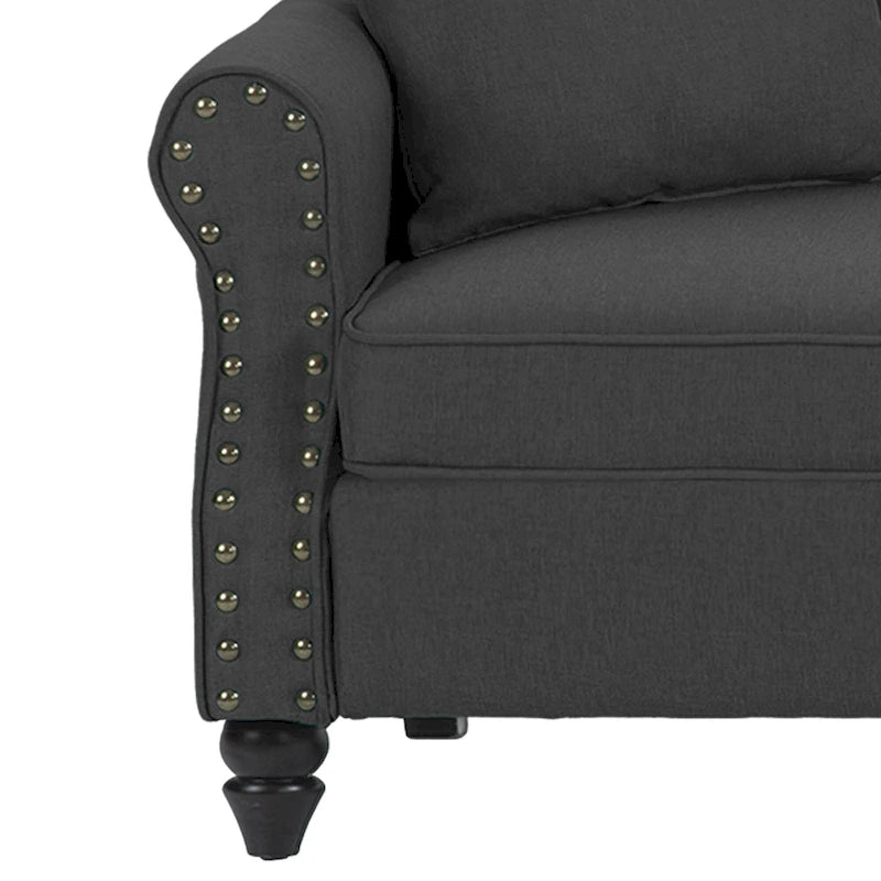 Canapé 73 avec accoudoirs roulés et finition à clous décoratifs